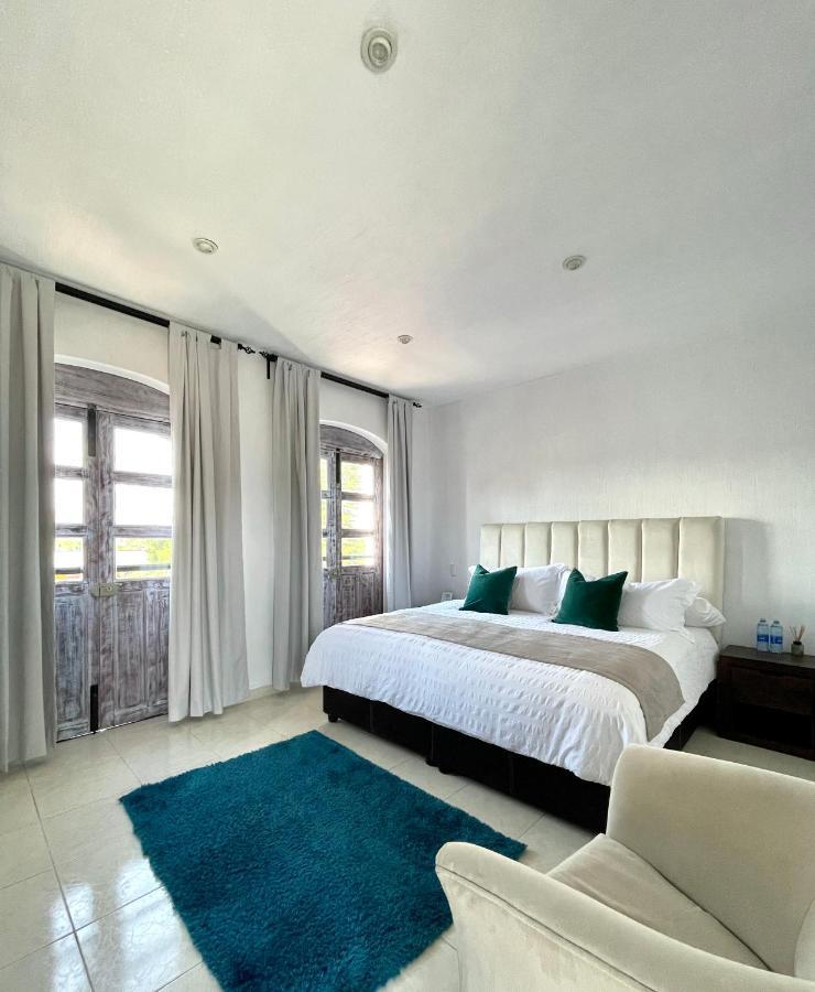 Suite Los Angeles เตโกซาอุตลา ภายนอก รูปภาพ